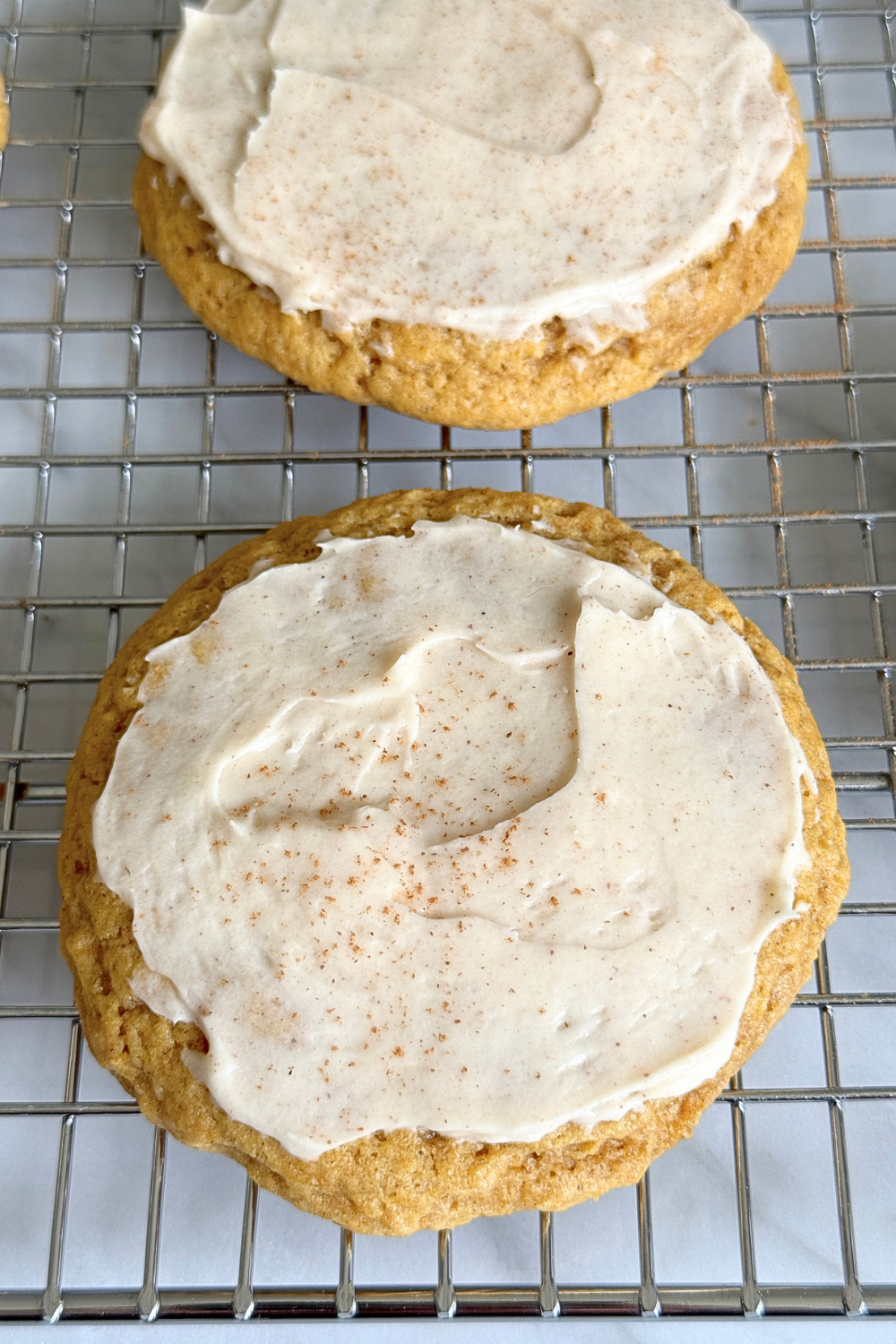 Soft Frosted Pumpkin Cookies