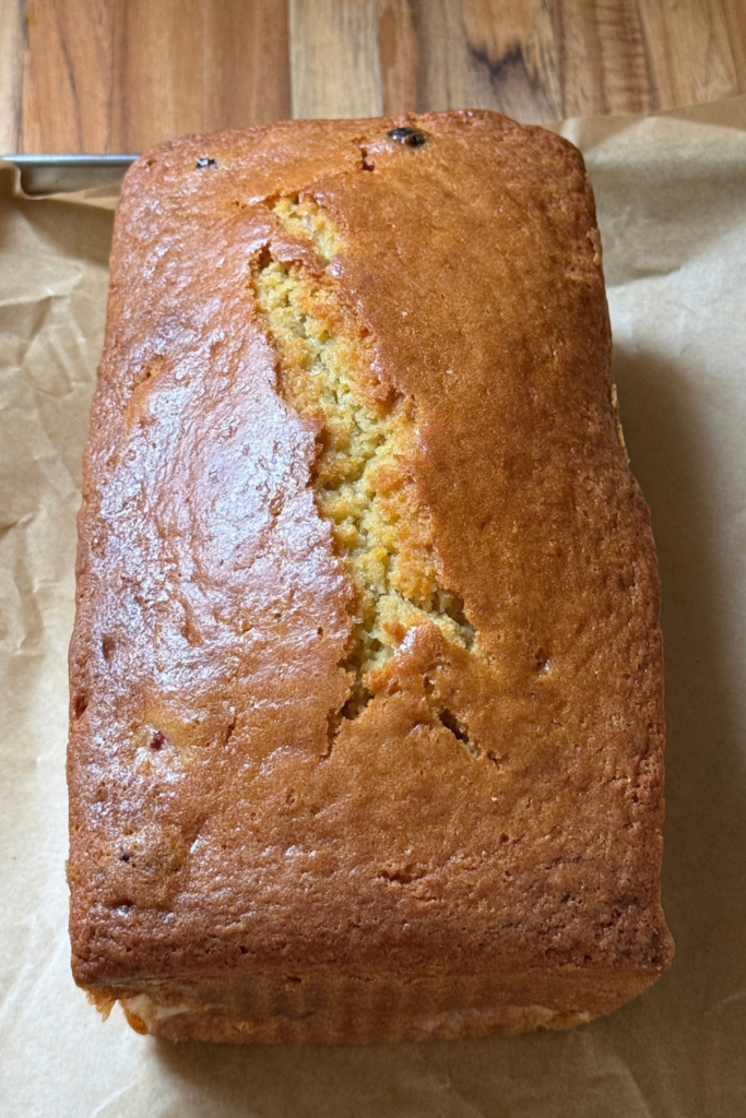 Freshly baked cranberry orange bread cooling